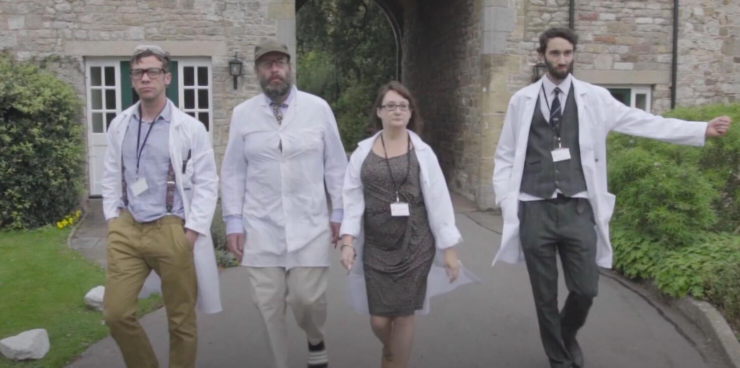 Scientists walking in a row